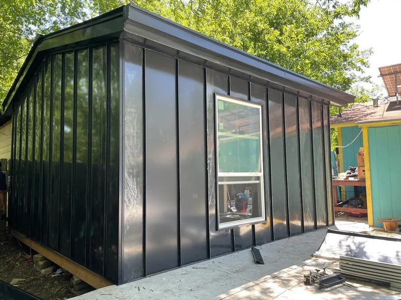 Black standing seam metal wall panels for Metal Roof Installation in Dubuque