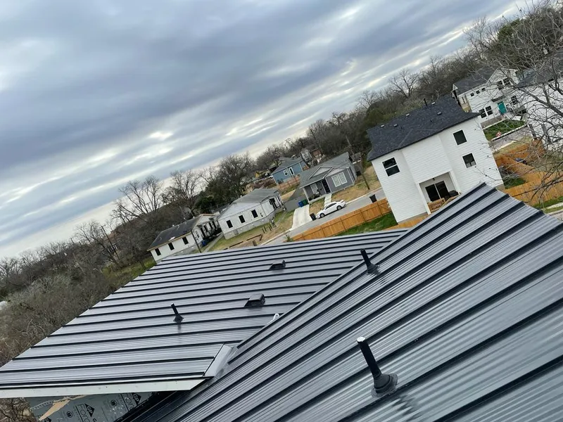 Standing seam metal roof panels with vents for Skylight Repair in Dubuque